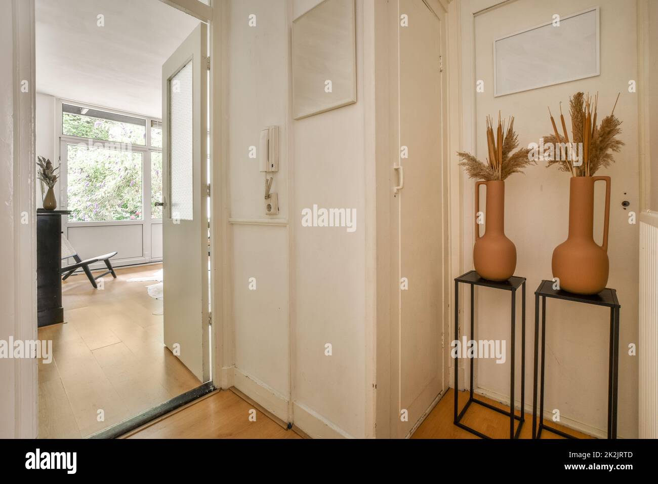 Small hallway with many doors Stock Photo Alamy