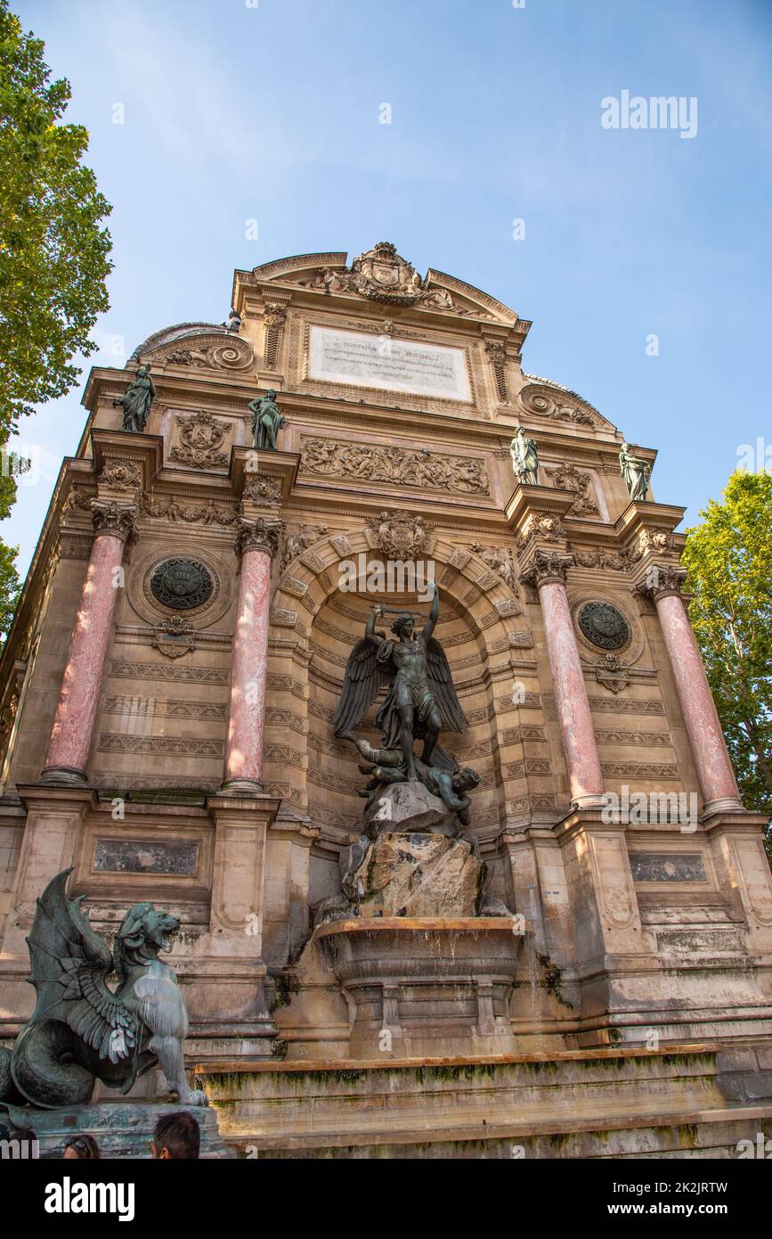 Paris, France. August 2022.. The Saint-Michel fountain, inaugurated in 1860, represents the Archangel Michael slaying the Devil in a triumphal arch su Stock Photo