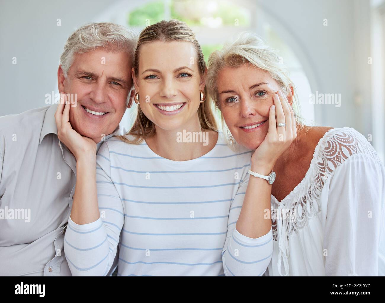 Care, support and portrait of grandparents with daughter for happy family, generations and love. Motivation, retirement and wellness with elderly Stock Photo
