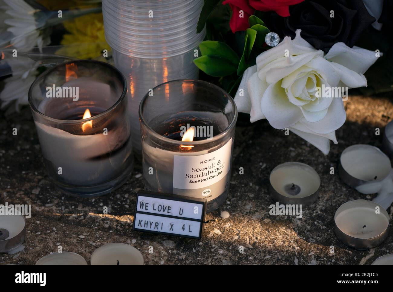 Tributes at the scene in Woodhouse Hill, Huddersfield, where 15-year-old schoolboy Khayri McLean was fatally stabbed outside his school gates. Picture date: Friday September 23, 2022. Stock Photo