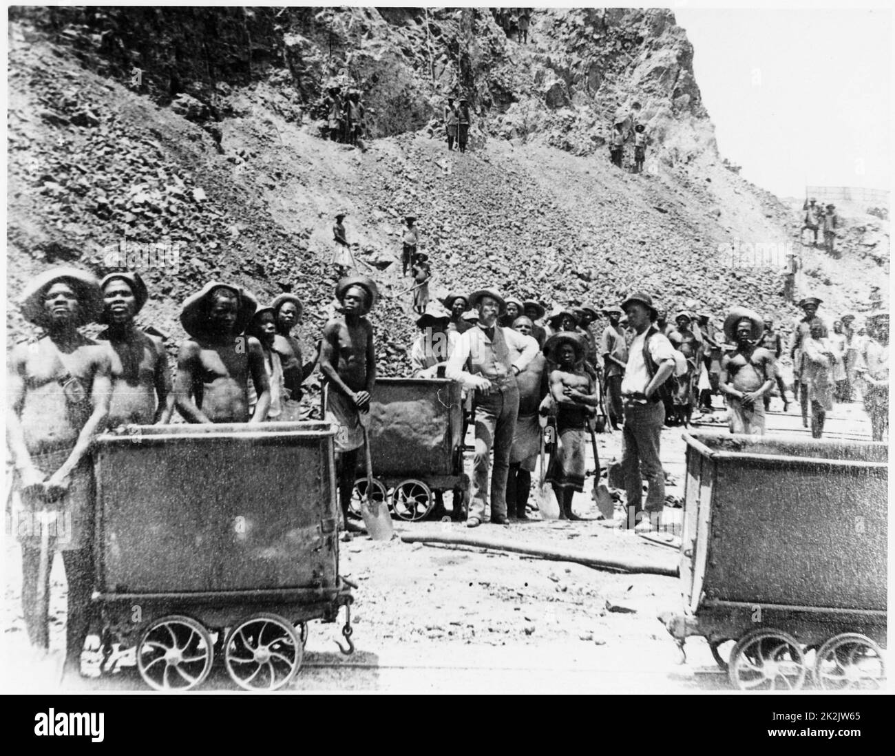 Zulu 'boys' at De Beers diamond mines. From photograph taken c.1885. In 1887 and 1888 Cecil Rhodes amalgamated the diamond mines around Kimberley, which included De Beers, into Consolidated Mines Stock Photo