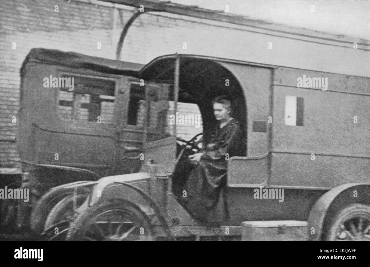 Marie Curie (1867-1934) Polish-born French physicist driving the Renault car converted into a radiological unit which, from August 1914, she drove from hospital to hospital. Stock Photo