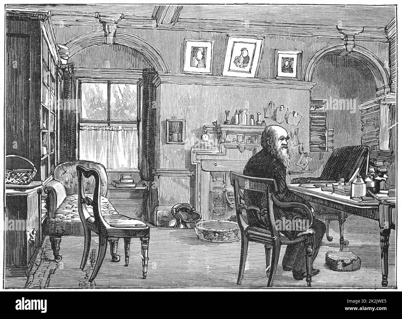 Charles Darwin (1809-1882) in his study at Down House, Beckenham, Kent. English naturalist. Evolution by Natural Selection. Engraving Stock Photo