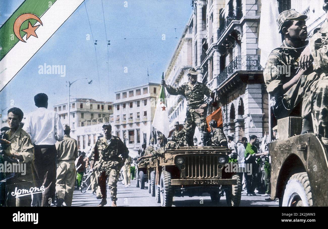 FLN troops parade through Algiers during the Algerian War Circa 1962 Stock Photo
