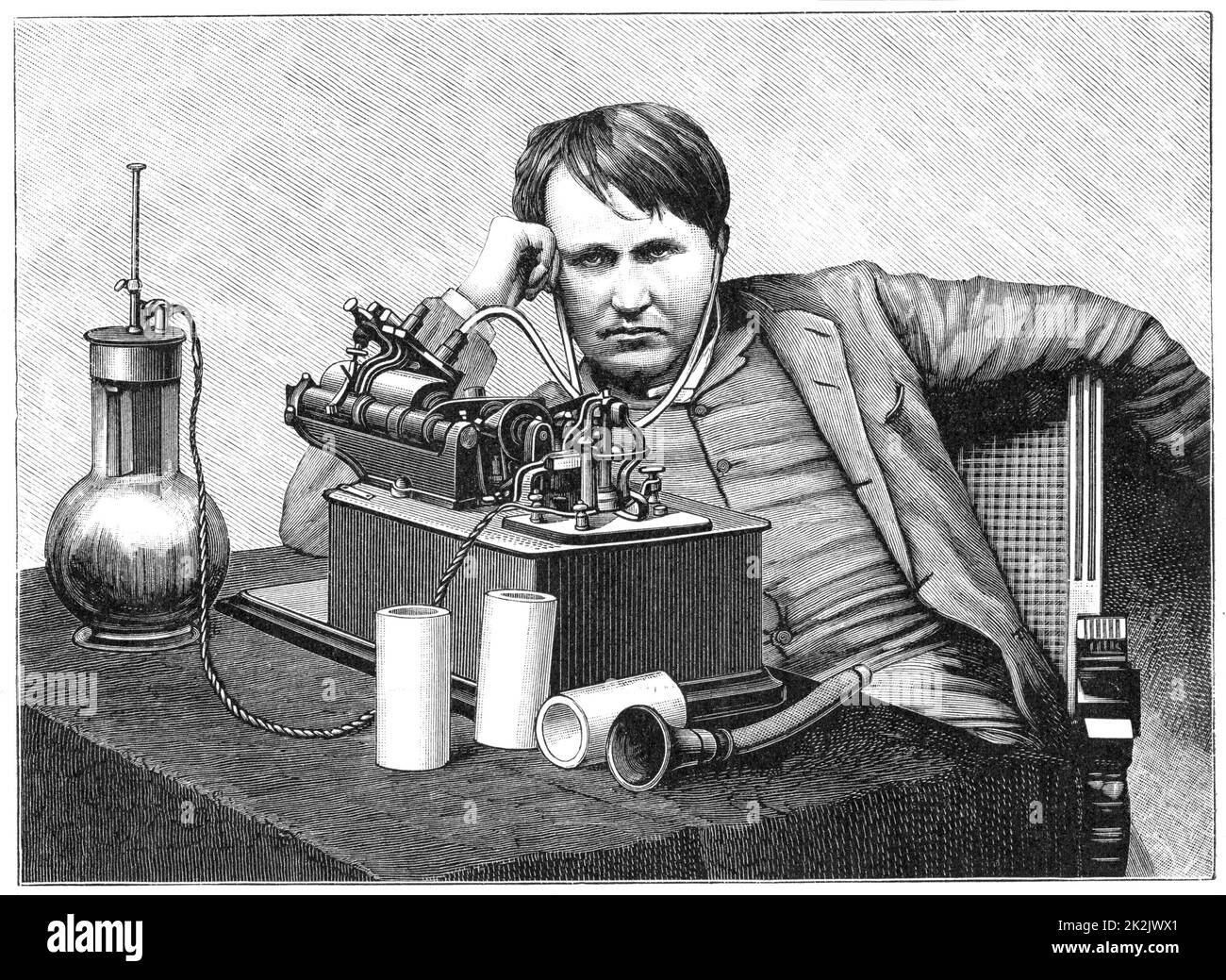Thomas Alva Edison (1847-1931) American inventor, listening to a recording on his phonograph. This is an electric model powered by a bichromate cell (left), a form of wet battery. Engraving c1895 Stock Photo