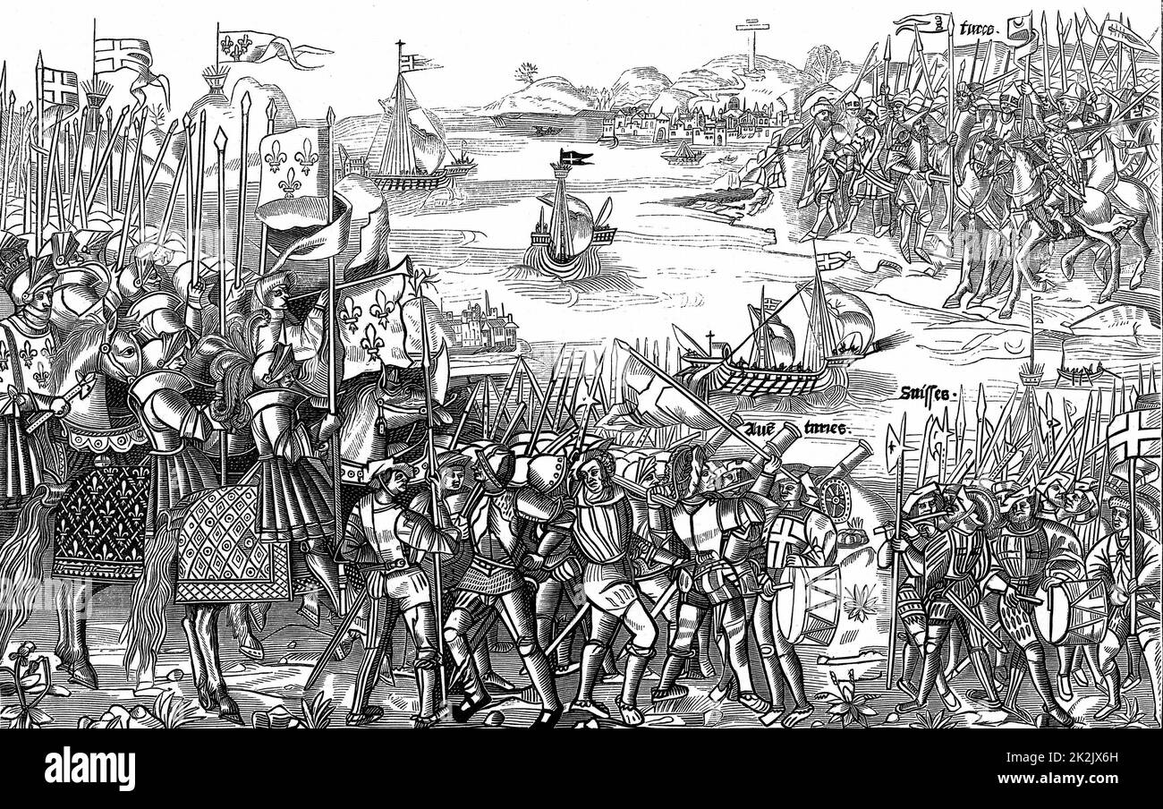 Saint Louis (Louis IX of France) on his first (the Sixth) Crusade disembarking of Damietta (Nile Delta) which he captured in 1249. Saracen army at top right. Woodcut from 'Grand voyage de Hierusalem' 1522 Stock Photo