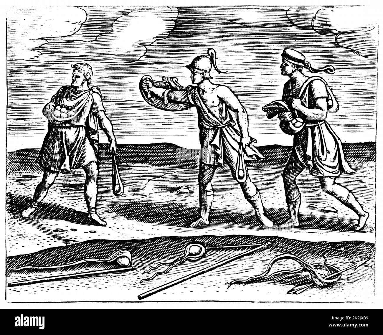 Roman soldiers: Stone slingers and their equipment. Three men all carrying short hand slings, while on ground are sling sticks which gave missiles greater impetus. From Justus Lipsius 'Poliorceticon…' Antwerp 1605. Copperplate engraving Stock Photo