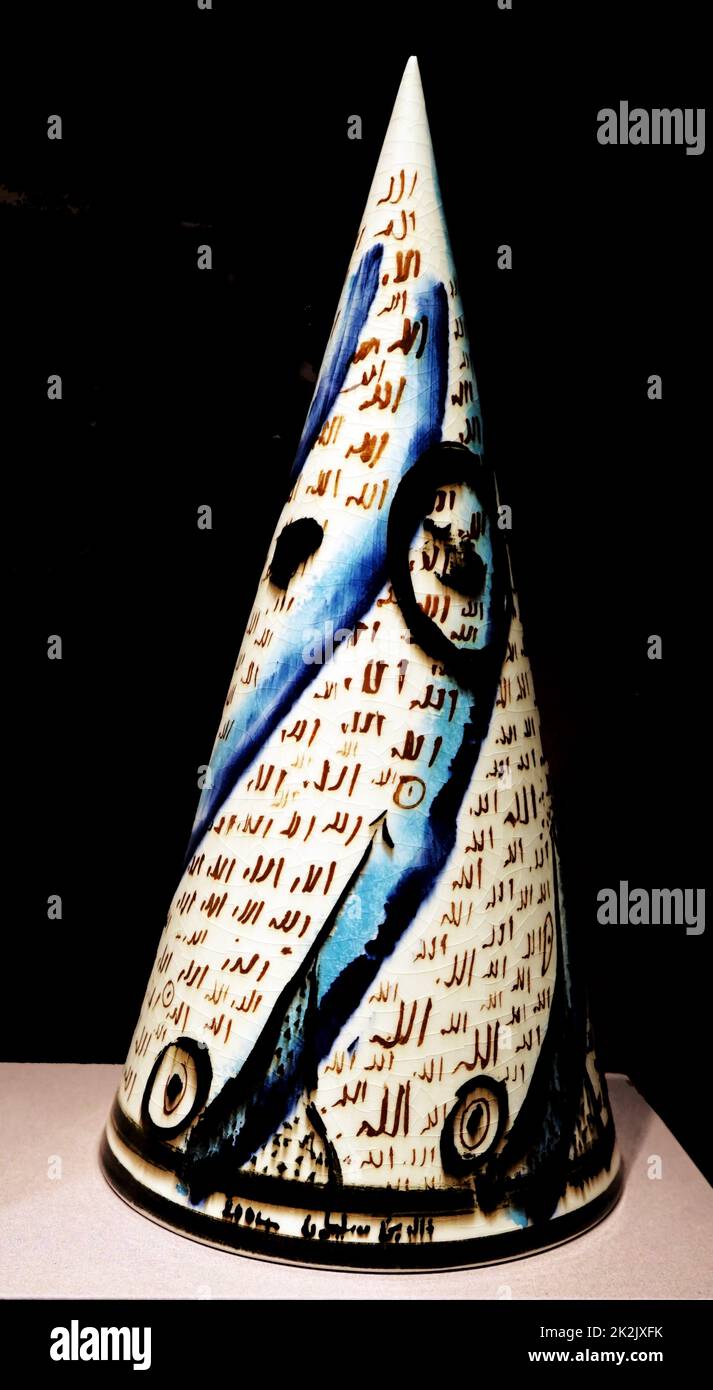 Glazed pottery cones from Tunisia by Khaled Ben Simane worn by Sufi mystics. Dated 2000 Stock Photo