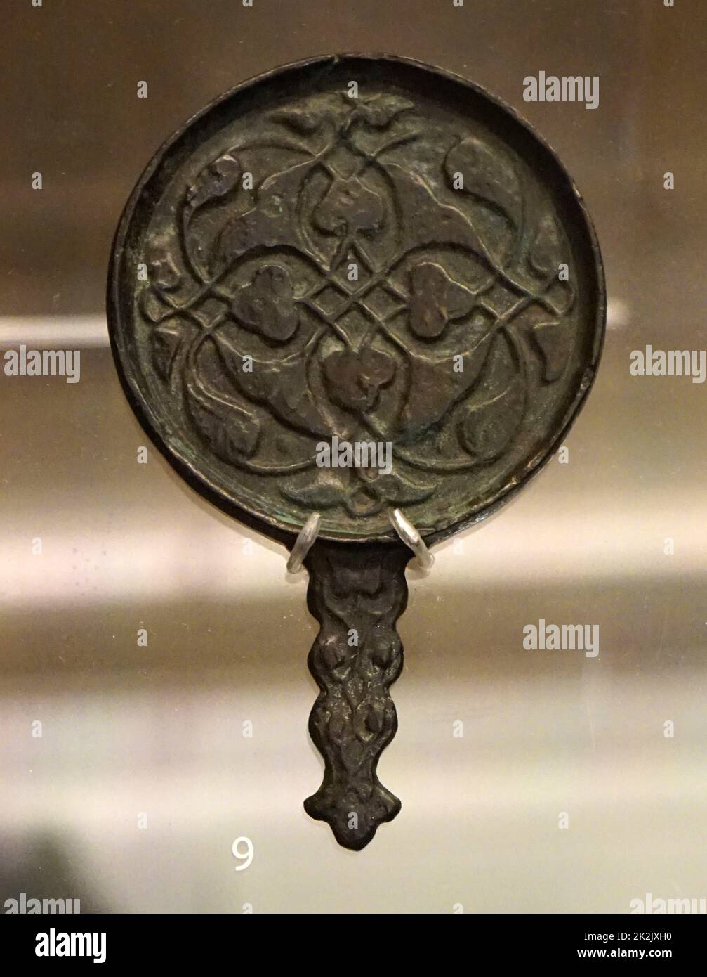 Medieval mirrors from the Eastern Islamic world, made from cast copper alloy. Dated 11th Century