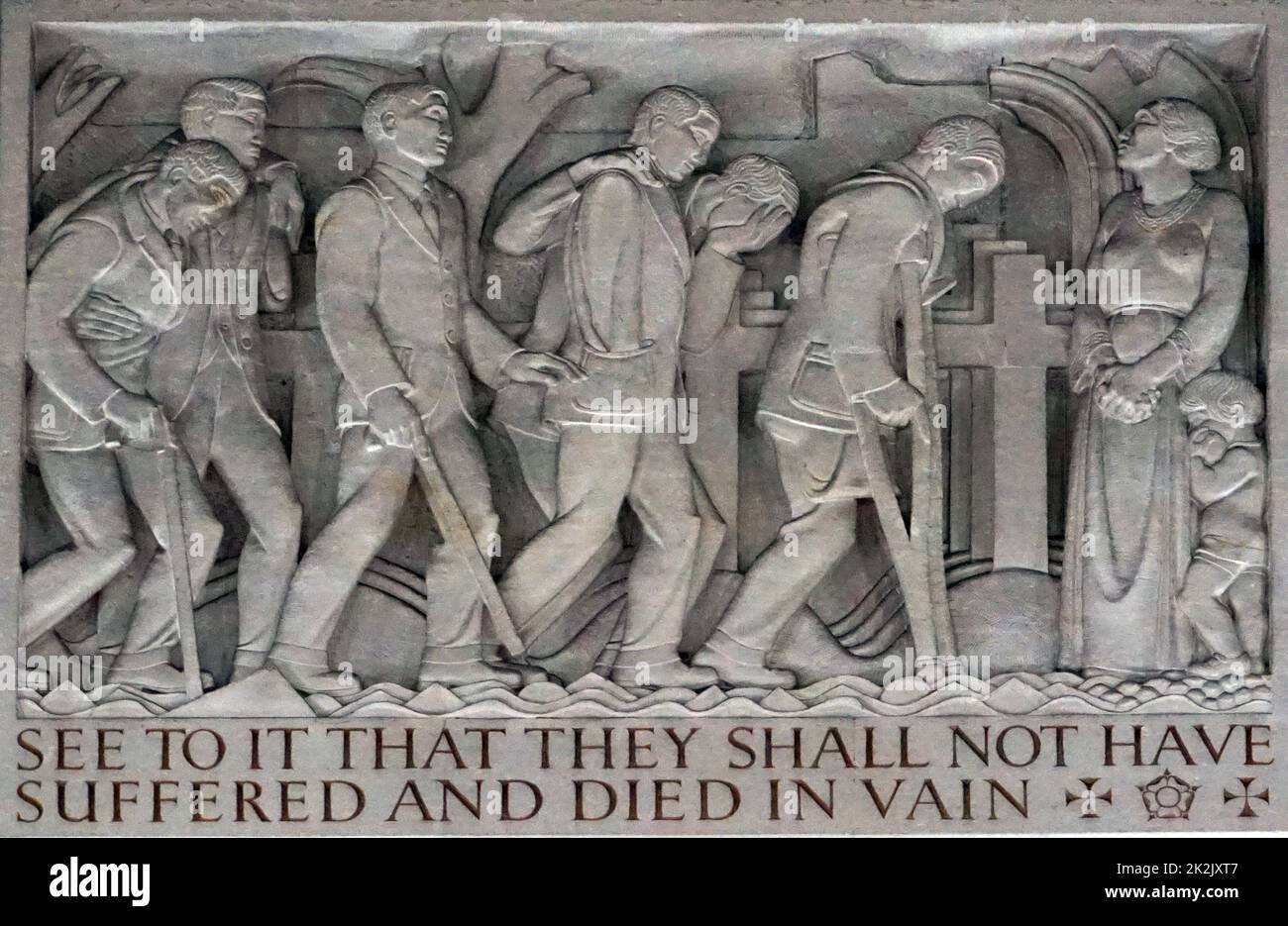 relief carved inside the  Hall of Memory in Centenary Square, Birmingham, England, designed by S. N. Cooke and W. N. Twist, is a war memorial erected 1922ñ25, by John Barnsley and Son, to commemorate the 12,320 Birmingham citizens who died in World War I Stock Photo