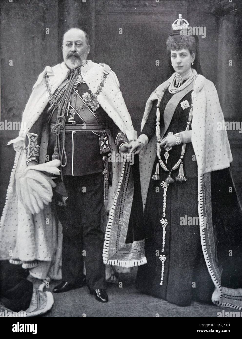 Photograph of King Edward VII (1841-1910) and Queen Alexandra of Denmark (1844-1925) wearing the robes in which they would open parliament. Dated 19th Century Stock Photo
