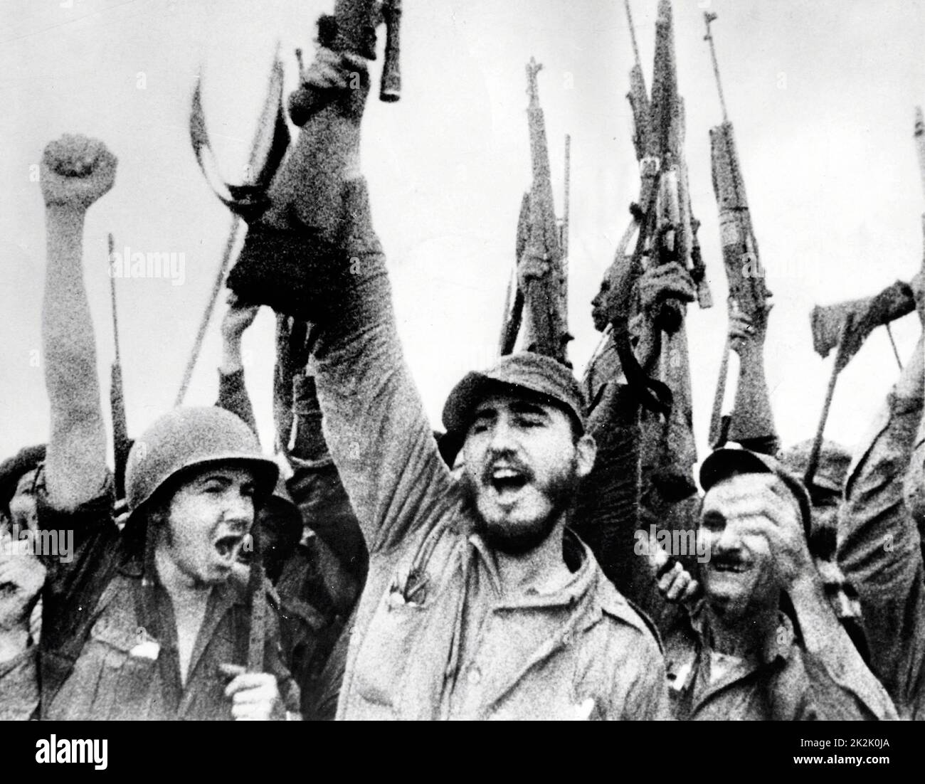 Fidel Alejandro Castro with guerilla fighters in the Sierra Maestra ca. 1958. Stock Photo