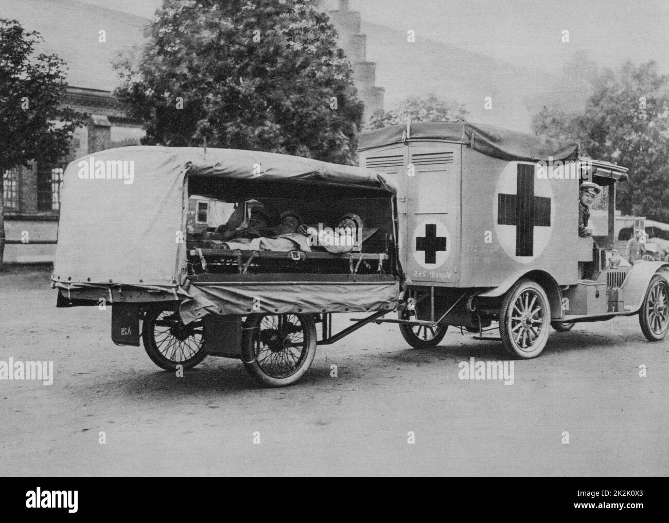 World War I 1914-1918: Wounded German soldiers on stretchers in a motorised ambulance painted with the Red Cross, Eatern Front, 1915. Military, Army, Medicine, Casualty, Automobile Stock Photo