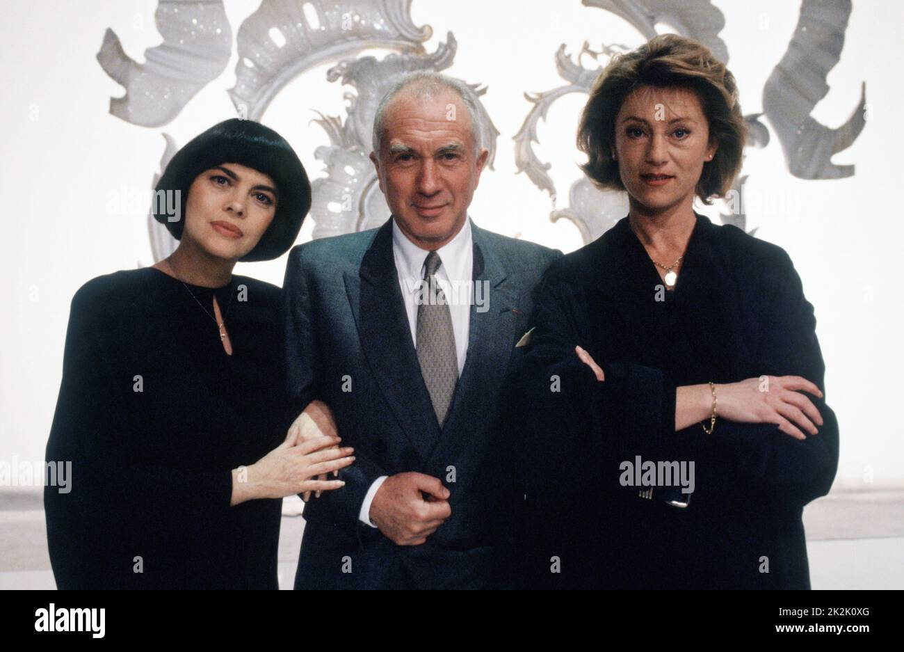 The pianist Alexis Weissenberg with the singers Sheila and Mireille Mathieu. April 1990 Stock Photo