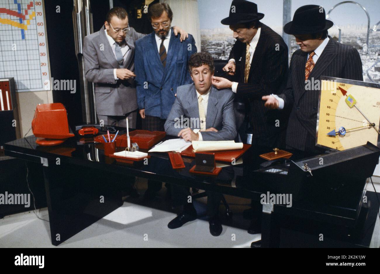 Jean Roucas, ?, Stéphane Collaro, Philippe Bruneau and Michel Saillard  in a sketch for the comedy TV show 'Cocoricocoboy', in 1986. Stock Photo