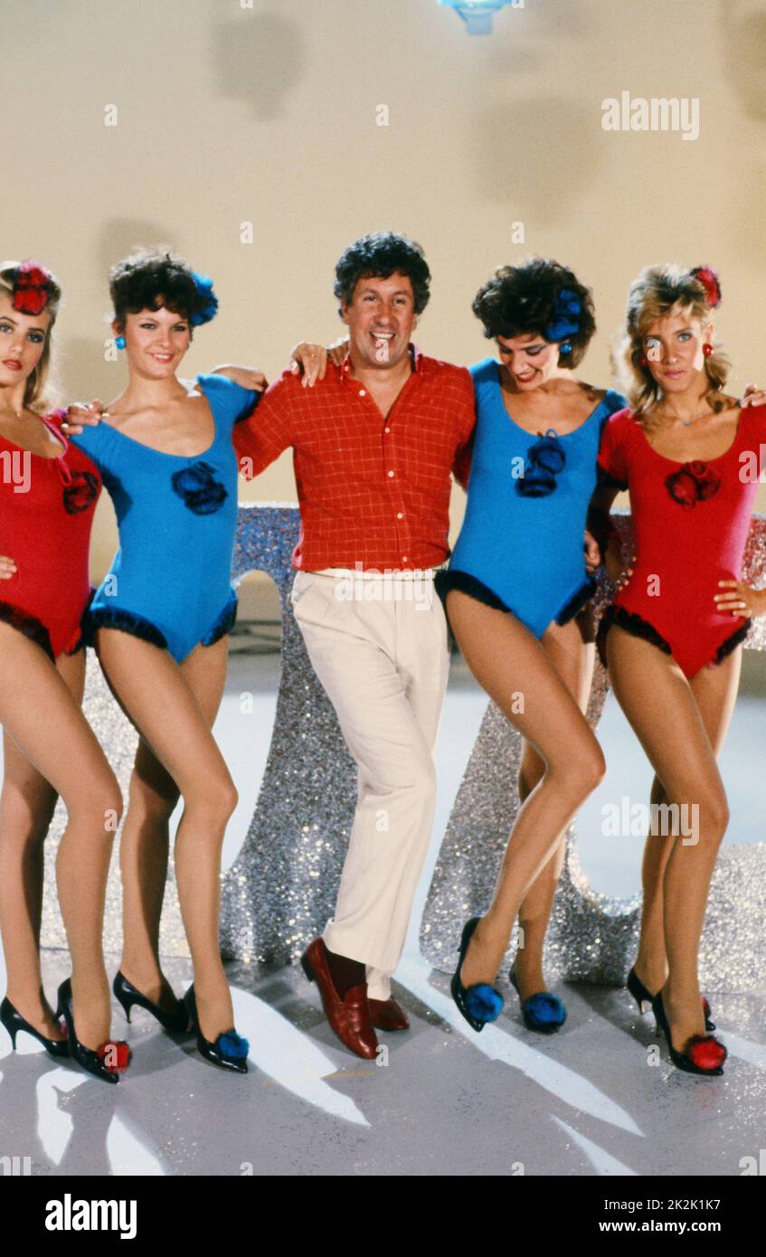 Stéphane Collaro on the set of the comedy TV show 'Co-co boy'. From left to right: Sophie Favier, ?, Stéphane Collaro, Terry Shane and Natasha Guinaudeau. 1984 Stock Photo