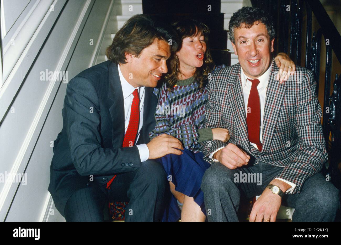 Businessman Bernard Tapie, television producer Marie-France Brière and comedian Stéphane Collaro. 1986 Stock Photo