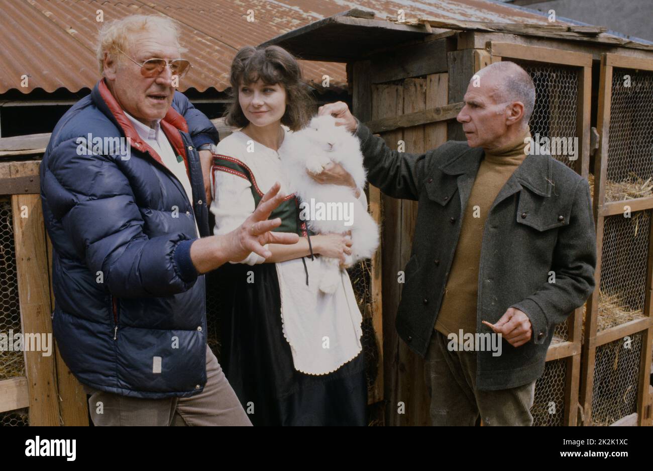 Actors Georges Wilson, Macha Méril and Jacques Dufilho during the shooting of the episode 'Chêne et lapins angora' from the TV series 'Emmenez-moi au théâtre', directed by Georges Wilson in 1982. Stock Photo