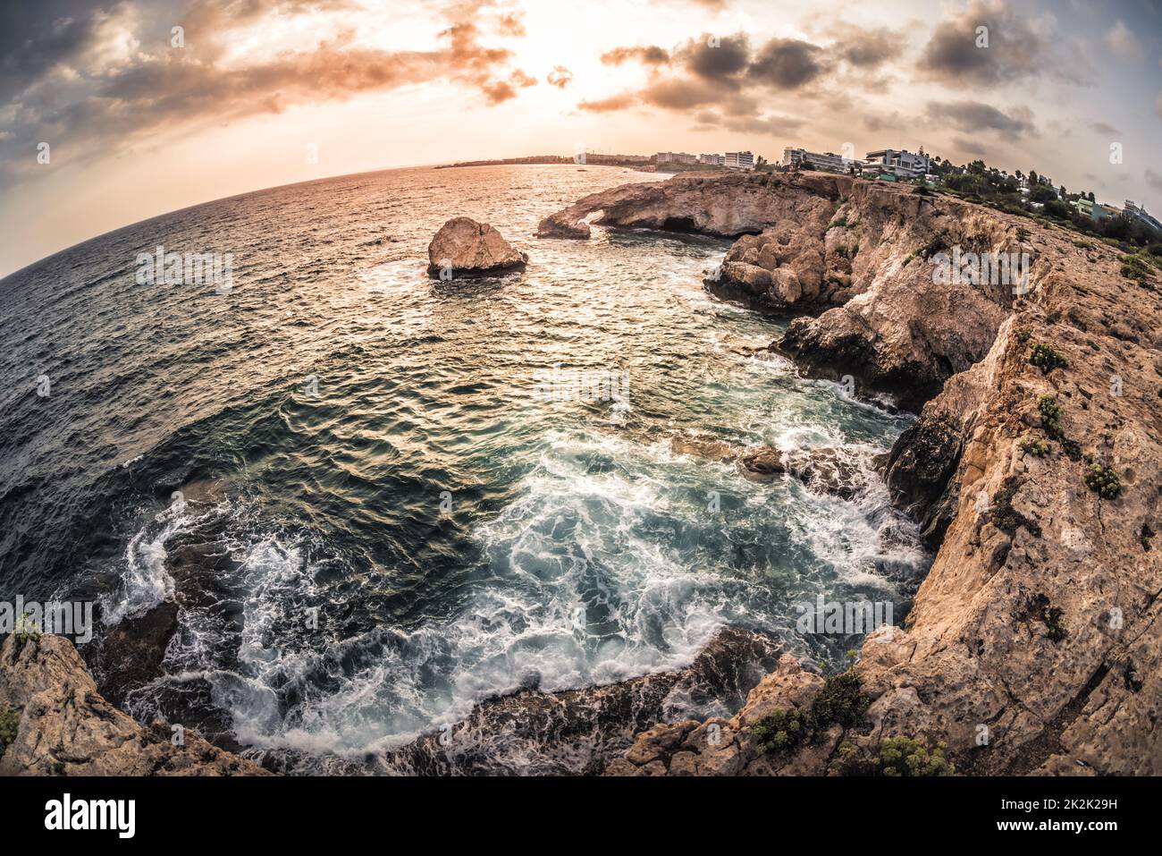 Natural rock arch near Ayia Napa at Cavo Greco natural park. Famagusta District, Cyprus Stock Photo