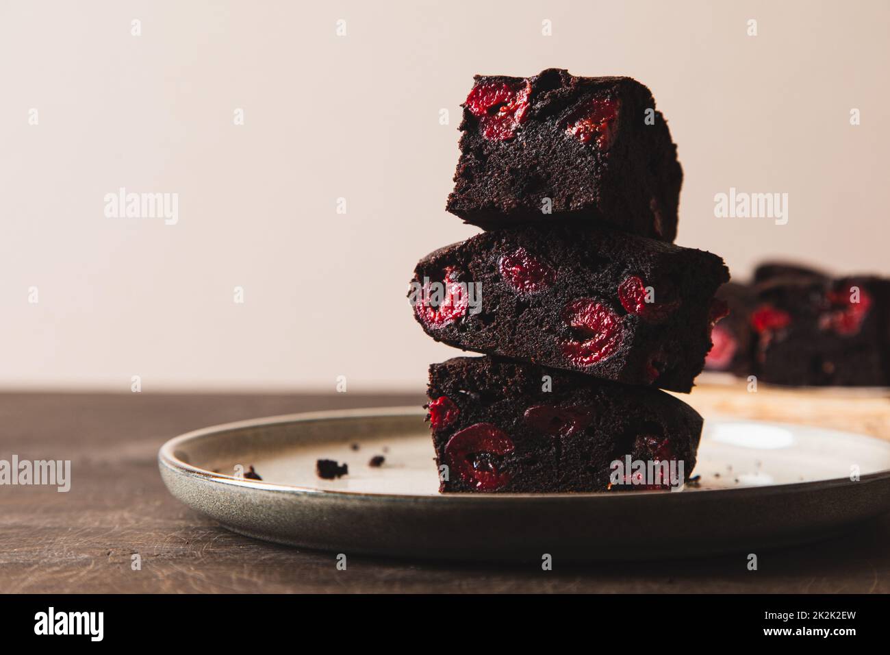 brownie with cherry. A stack of chocolate brownies, homemade bakery and dessert. Bakery, confectionery concept Stock Photo