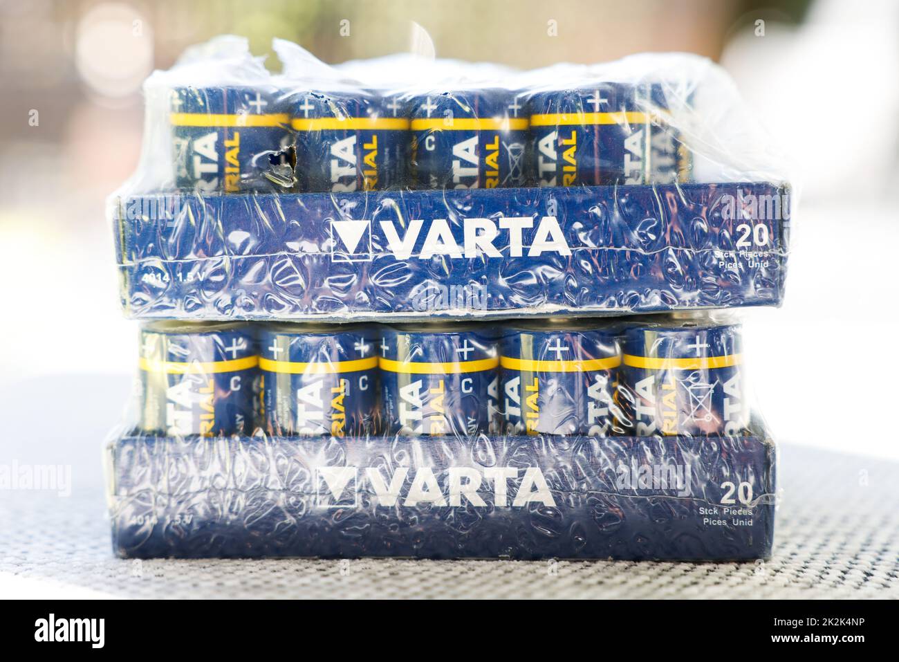 Two packs of batteries of the Brand Varta in a plastic wrapping. Mono size C. Stock Photo