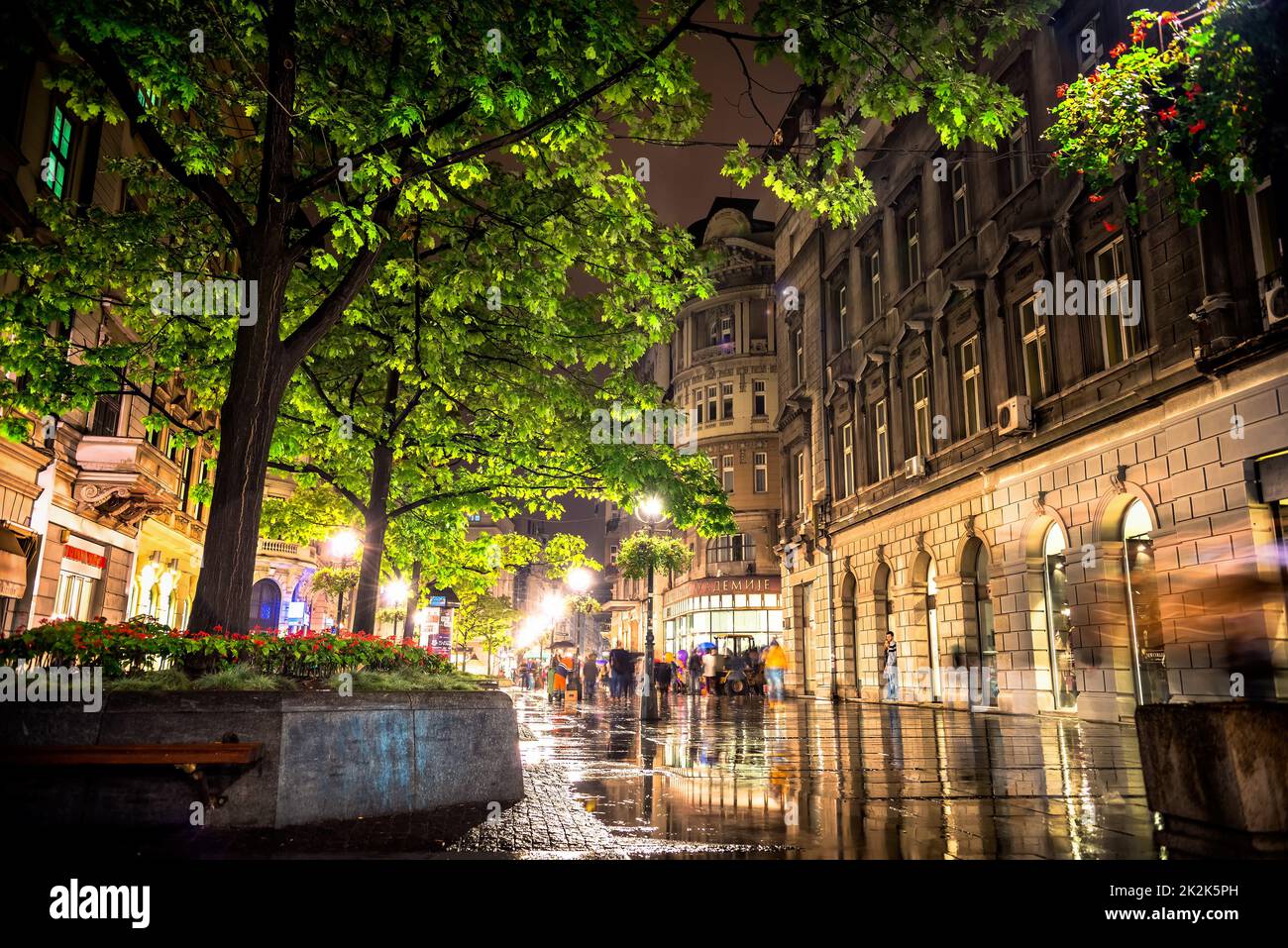 BELGRADE, SERBIA - SEPTEMBER 25: Rainy inght at Knez Mihailova Street on September 25, 2015 in Belgrade, Serbia. Street is the main shopping mile of Belgrade Stock Photo