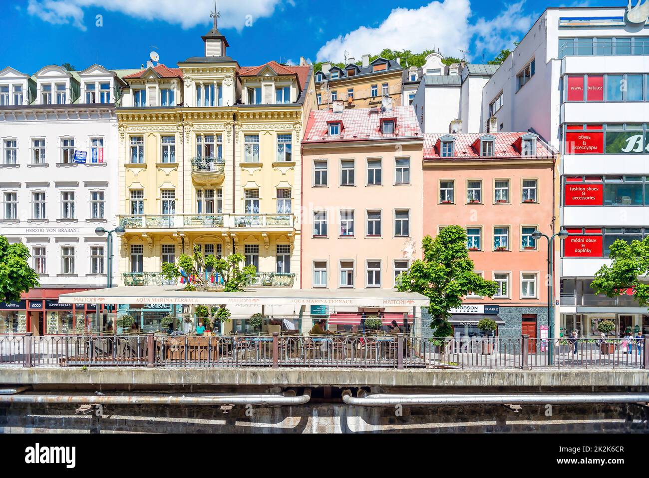Karlovy Vary, Czech Republic - May 26, 2017: Colorful buildings on the street by Tepla river Stock Photo