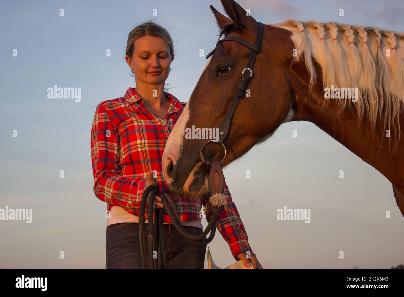 Girl loving her horse Stock Photo