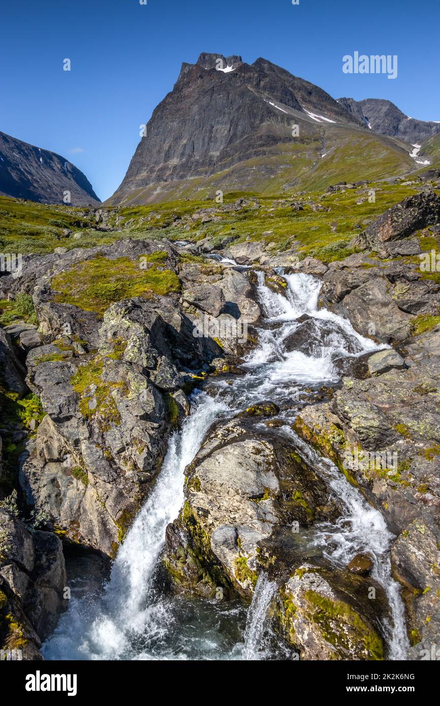stunning waterfall in the mountains, hiking the kungsleden in swedish lapland Stock Photo