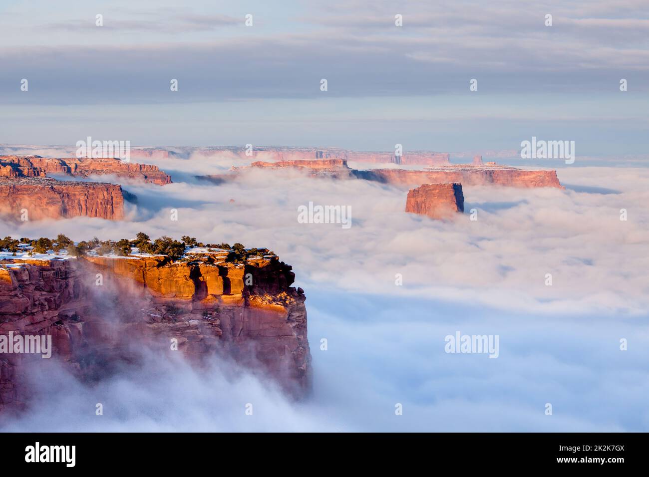 The top of the Airport Tower above the clouds of a winter temperature