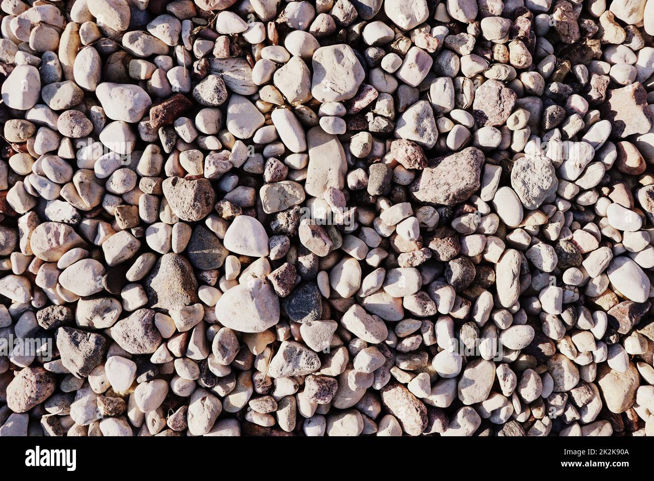 Pebble abstract background with dry round reeble stones Stock Photo