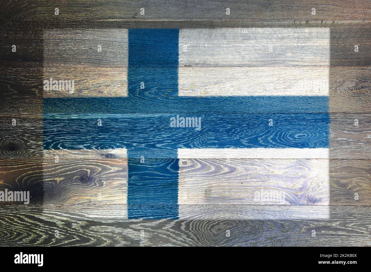 Finland flag on rustic old wood surface background Stock Photo - Alamy