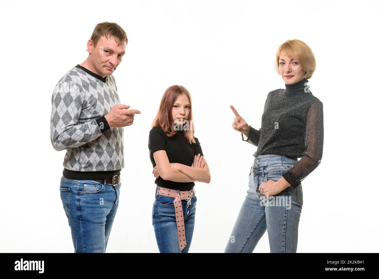 Mom and dad scold daughter Stock Photo