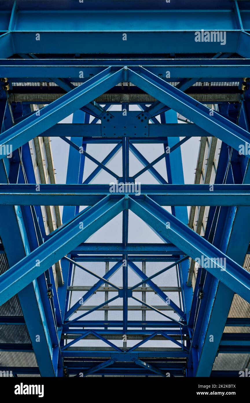 blue steel construction of a crane, steel braces, symmetrical structure