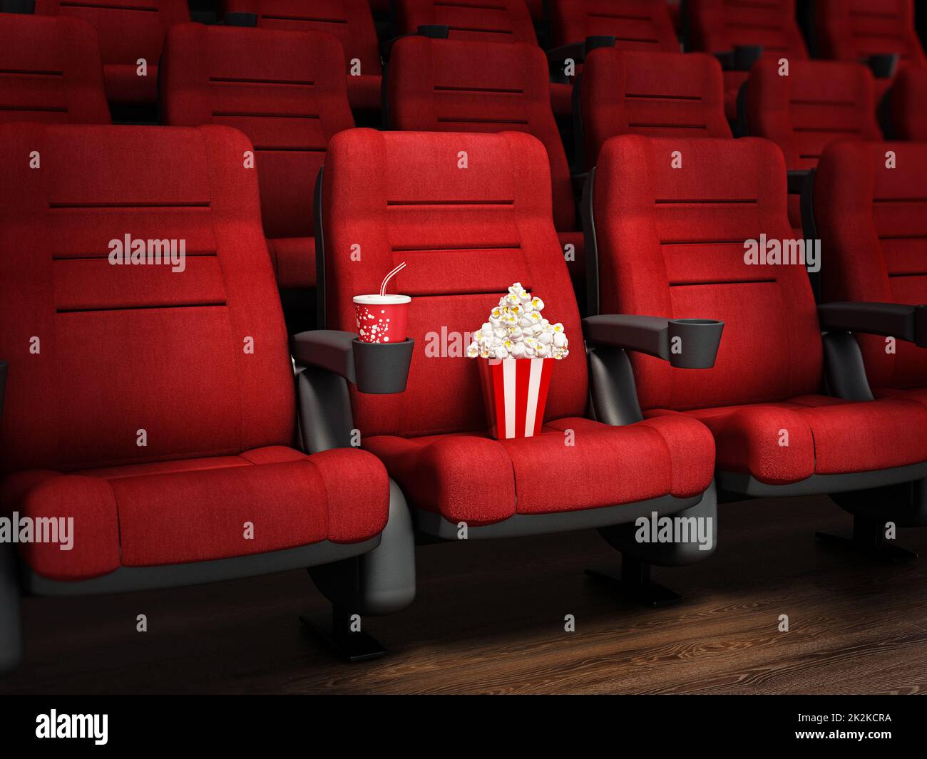 Spotlit red cinema chair with popcorn and soda. 3D illustration. Stock Photo