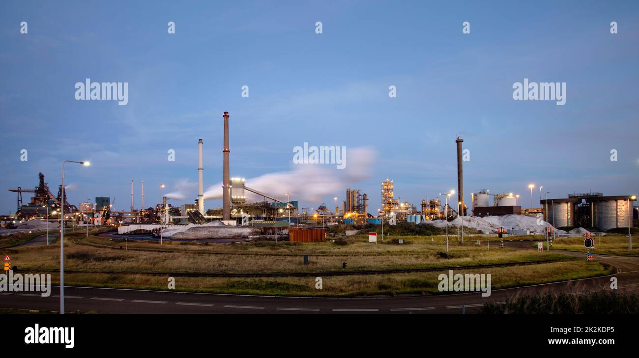 Industrial landscape at twilight in Wijk aan Zee in the Netherlands Stock Photo
