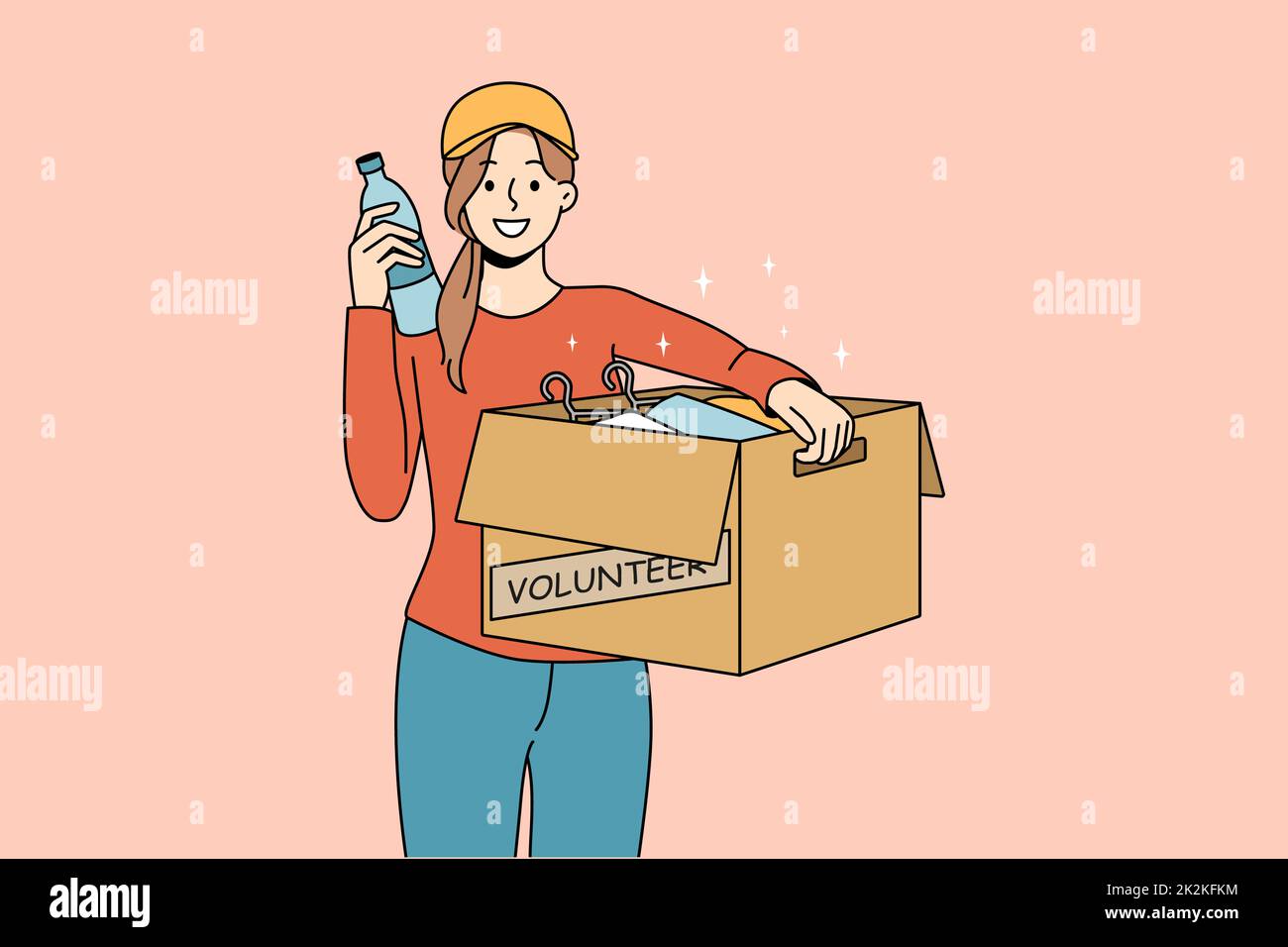 Woman volunteer hold box with food and supplies Stock Photo