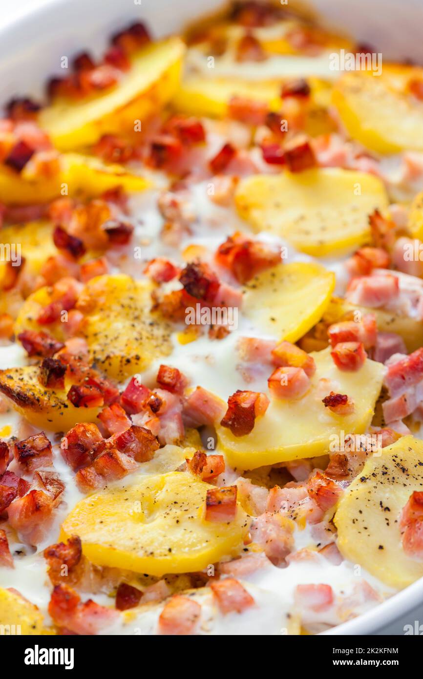 baked potatoes with bacon and eggs Stock Photo