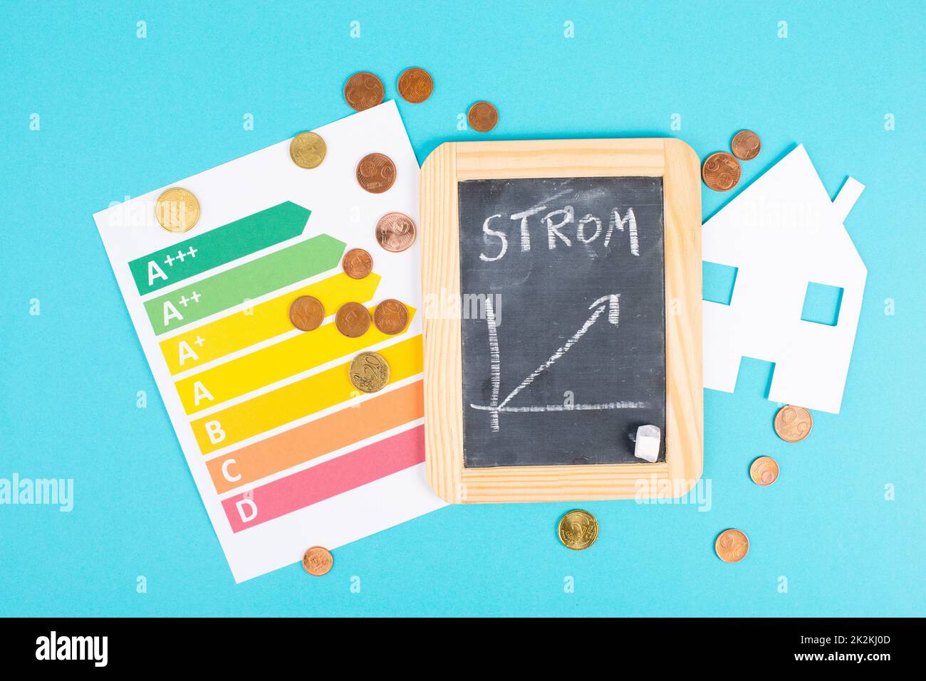 Chalkboard with grafic, Euro money coins, power consumption grafic