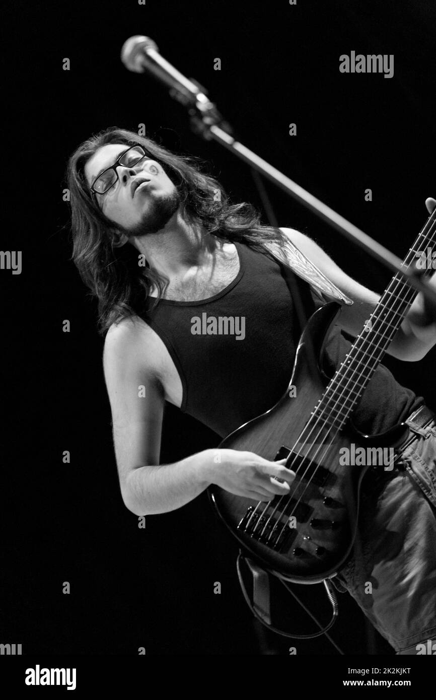 Bass guitar player live on stage Stock Photo Alamy