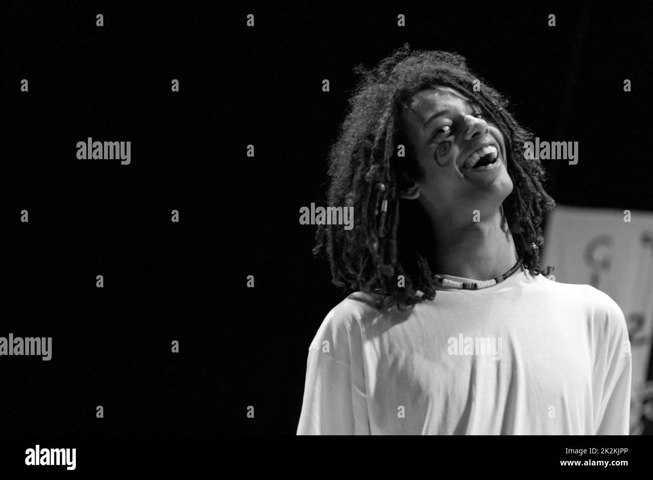 Rasta hair singer performing live on stage Stock Photo Alamy