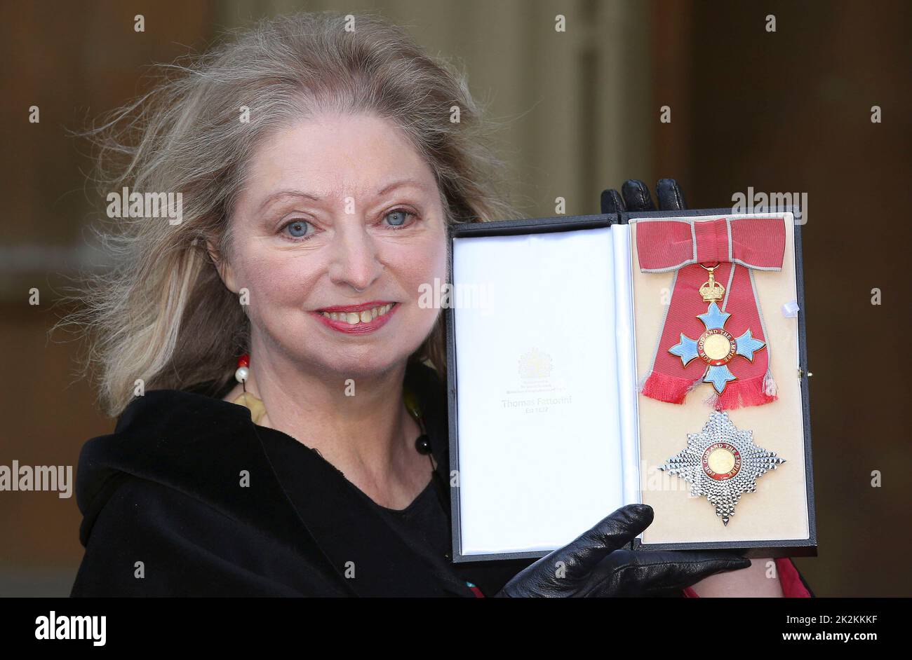 File photo dated 06/02/15 of writer Dame Hilary Mantel holding her Dame Commander of the British Empire medal presented to her for services to literature at an Investiture ceremony at Buckingham Palace in central London. The Wolf Hall writer has died "suddenly yet peacefully" surrounded by close family and friends aged 70, HarperCollins has announced. Issue date: Friday September 23, 2022. Stock Photo