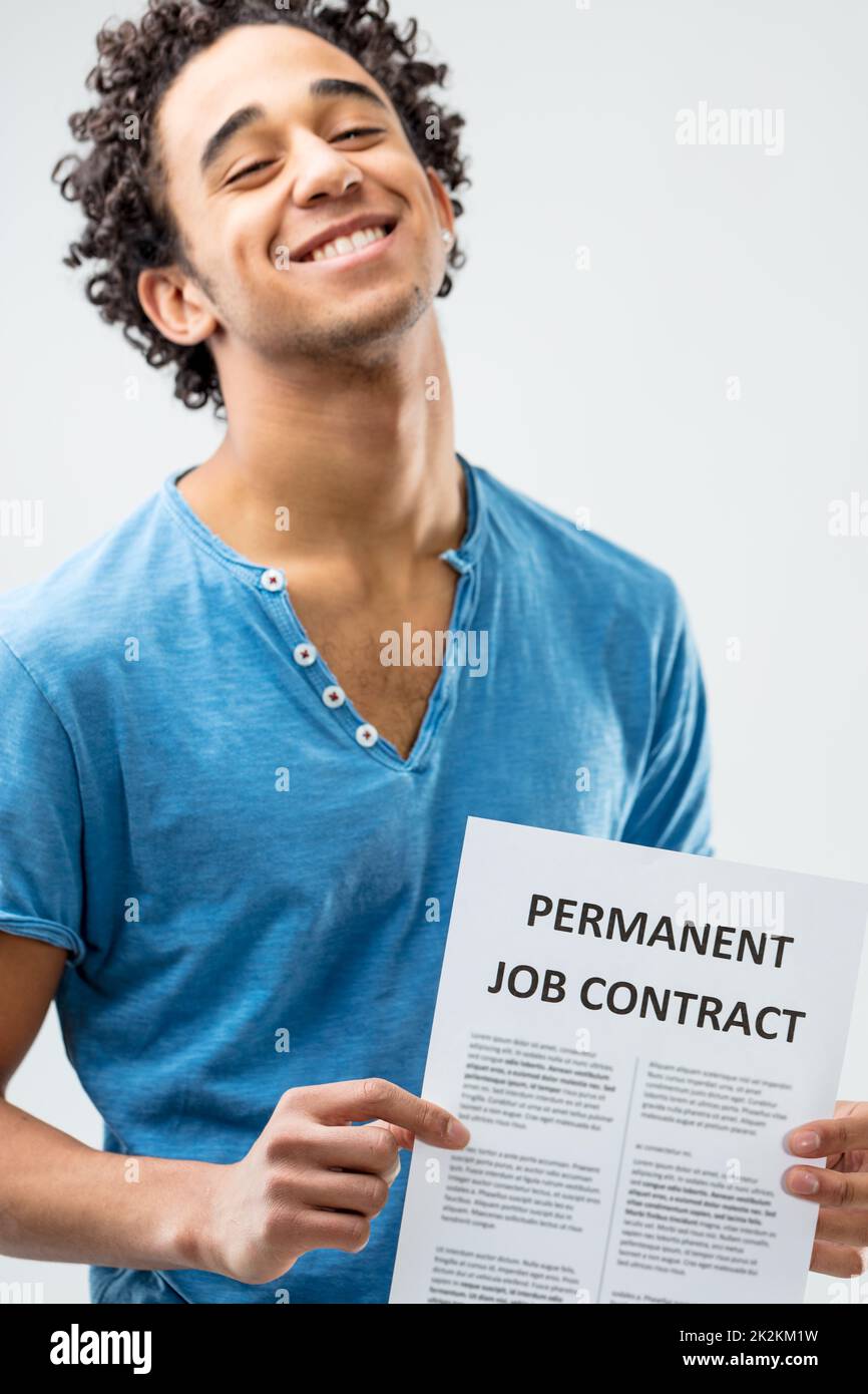 the miracle of a permanent job contract Stock Photo