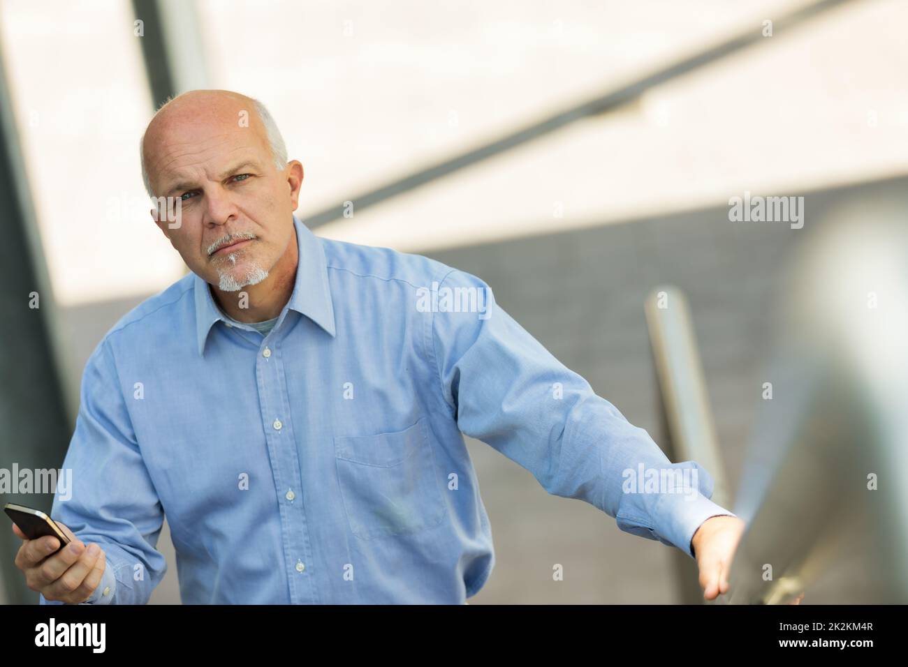 Strong and dynamic man with an attentive and curious walking Stock ...