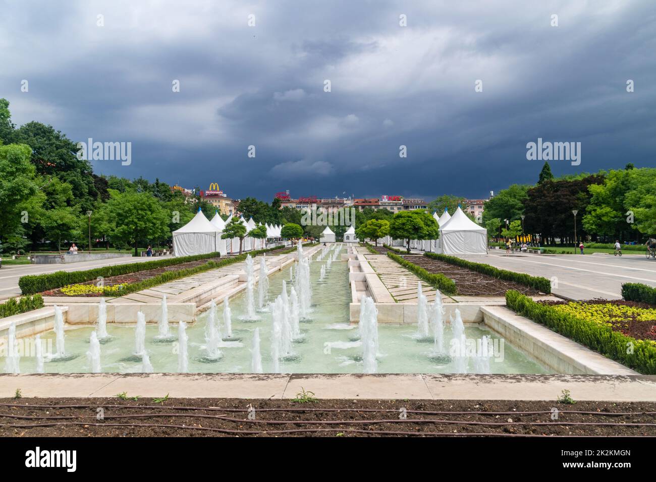 Sofia, Bulgaria - June 6, 2022: Fountains at National Palace of Culture (NDK) at cloudy day. Stock Photo