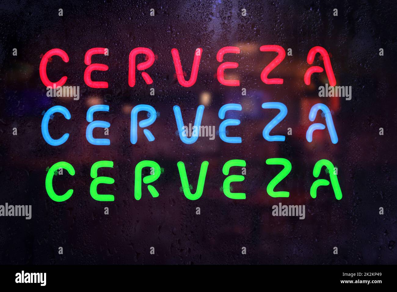 Vintage Neon Cerveza Sign in Rainy Window Cerveza is Spanish for Beer