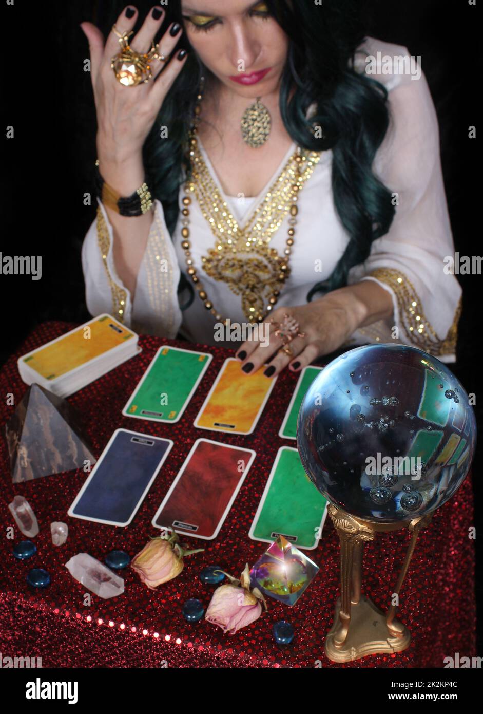 Psychic with crystal ball and tarot cards, Shallow DOF Stock Photo
