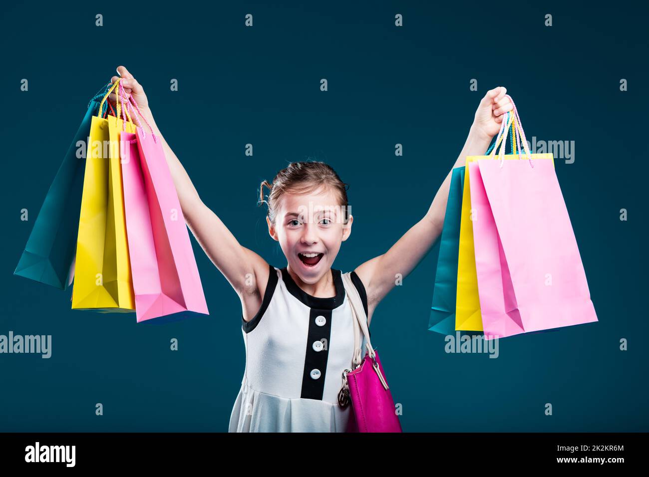 girl carrying lots of shopping bags Stock Photo Alamy