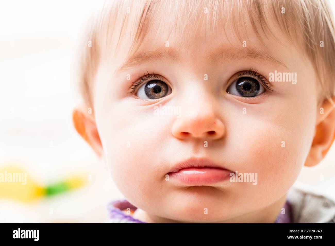 close up of children face with big eyes Stock Photo