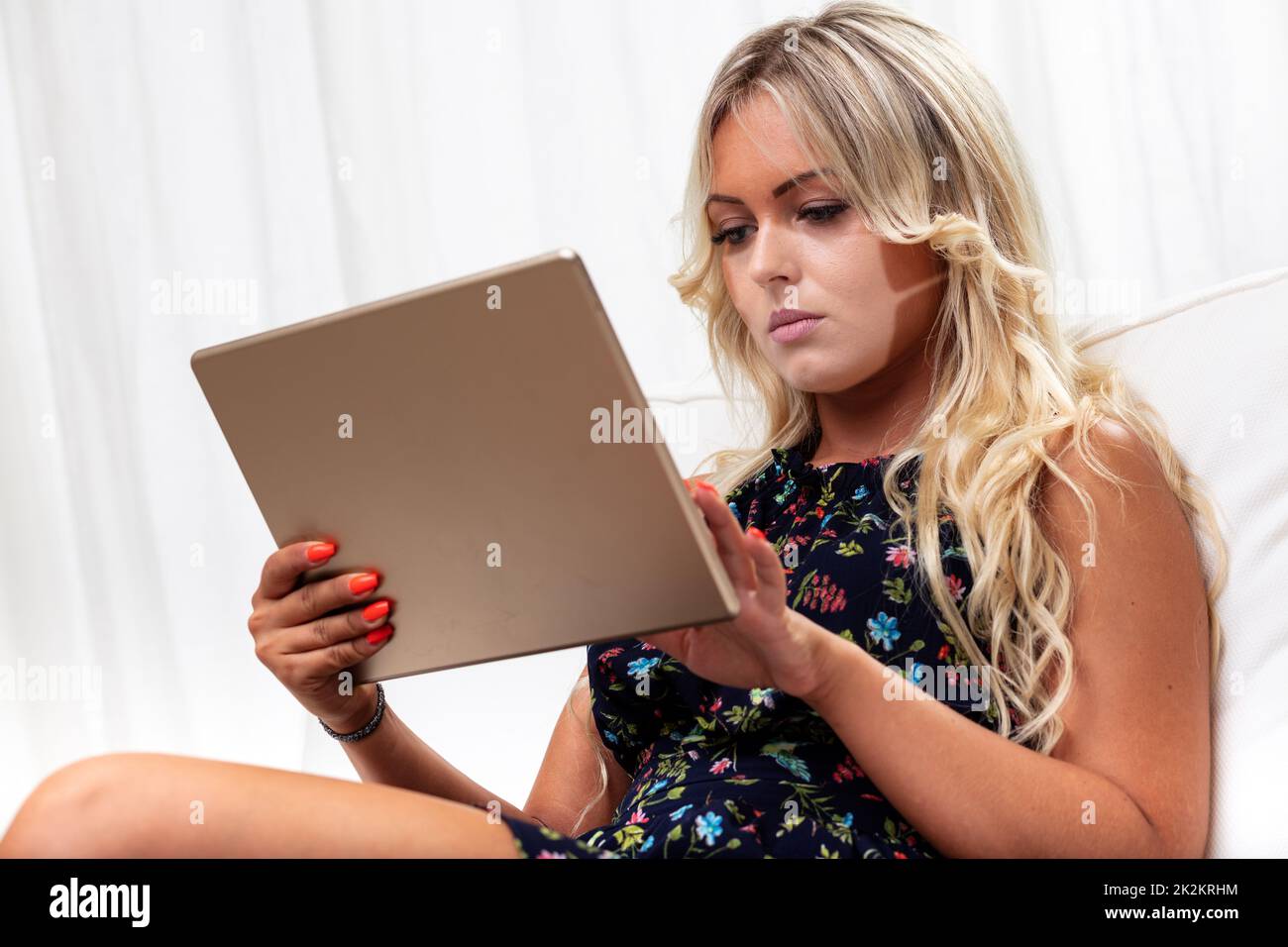 young blonde woman with mask tan lines on her face Stock Photo Alamy